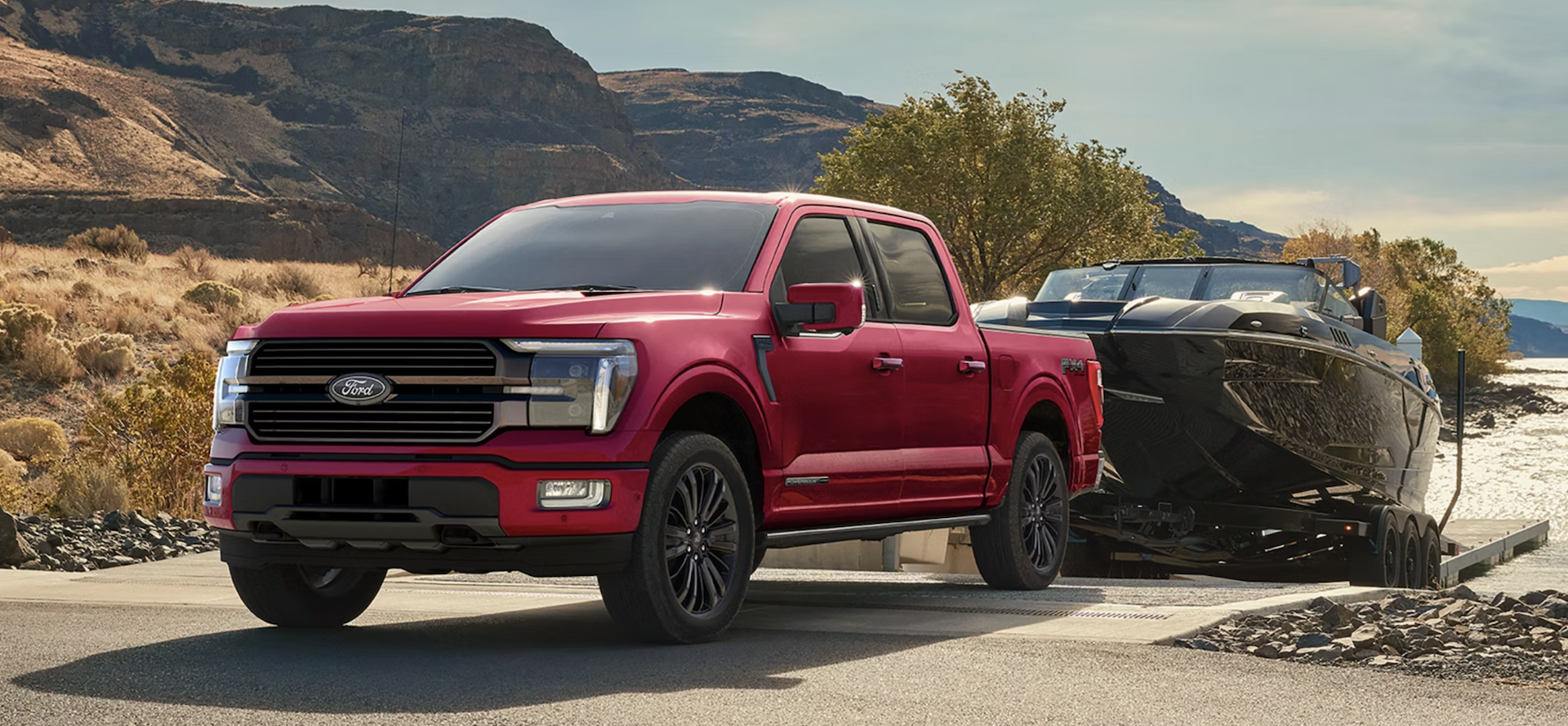 New red Ford F-150 towing a boat near San Antonio